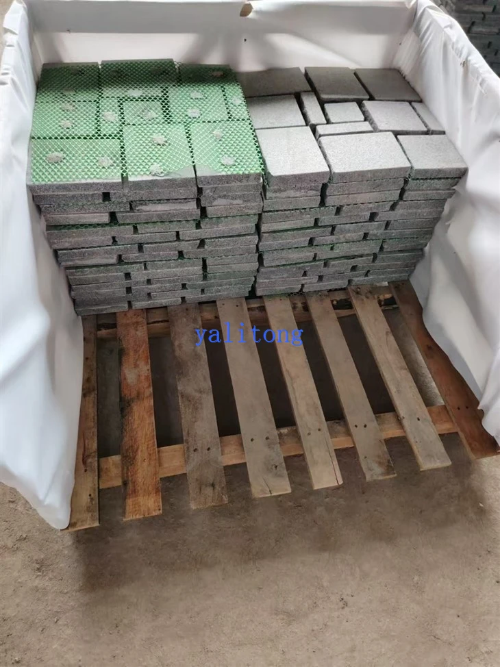 Cobblestone pavers on mesh sheets